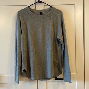 Coreio sweatshirt. Medium weight. Thumb holes. Rounded bottom covers leggings!